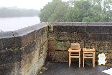 Coin stamping equipment by the side of the River Ribble.